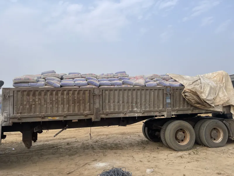 A truck loaded with bags of cement